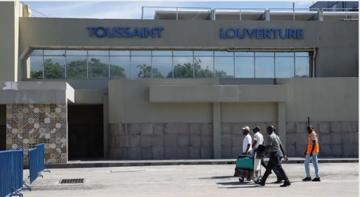 Change a flight from Florida to Haiti after being shot at over Port-au-Prince