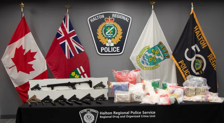 Three men from Toronto are facing 85 criminal charges in the investigation of arms and drug smuggling.