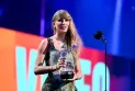 Trudeau sways to the tunes of Taylor's songs with enthusiasm and sings along, stirring controversy with his presence!