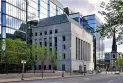 The Bank of Canada lowers interest rates for the fifth time as economic growth slows.