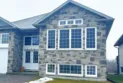 Un incendie détruit une maison à North Bay et le propriétaire est accusé en raison de l'absence de dispositifs d'alarme