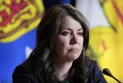 Alberta's Premier responds to Trump's tariffs and confirms cooperation with Ottawa in the response.