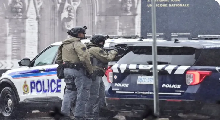 The Canadian police have arrested a man who barricaded himself inside the east wing of the Parliament building in Ottawa.