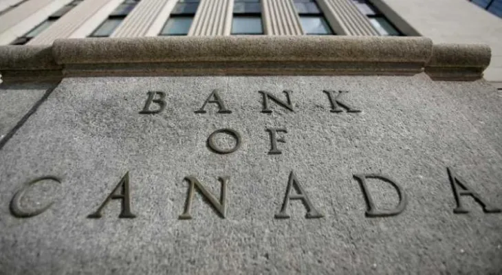 The Bank of Canada keeps the benchmark interest rate unchanged amid escalating trade tensions.