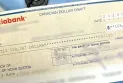 Petite entreprise en Ontario victime d'une fraude de 108 000 dollars via un chèque bancaire contrefait