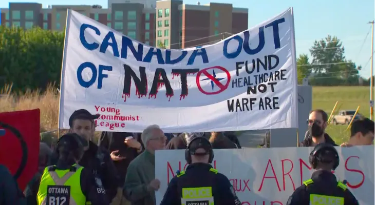 Arrest of 11 protesters outside the Defence Industries Exhibition in Ottawa amid anti-gun protests.