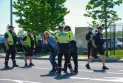 Arrest of a volunteer journalist during arms fair protests in Ottawa sparks debate over press freedom