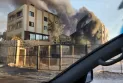 Syria - Intense smoke columns rising near the radio and television building in Damascus