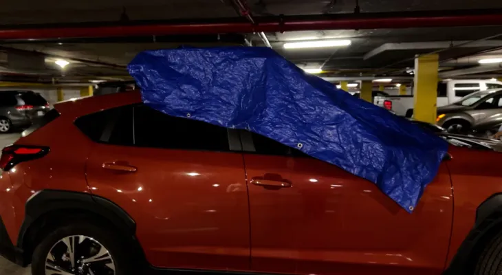A mysterious substance is leaking from the ceiling of a residential garage west of Ottawa and damaging residents' car paint.